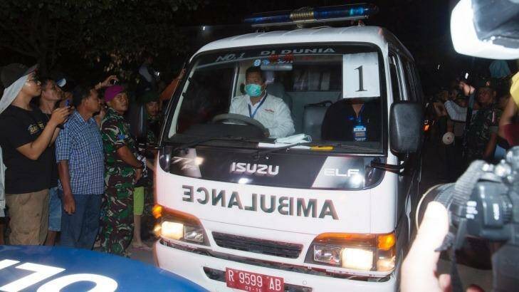 One of the ambulances carrying a coffin of one of the executed leaving Wijaya Pura in Cilacap. Photo: James Brickwood