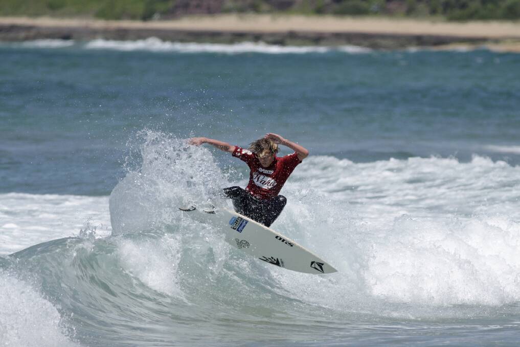 Young star: State champion Keanu Miller on his way to take third place in the under 14s at the Wahu Surfer Groms Comp series at Kiama. Picture: ETHAN SMITH, Surfing NSW