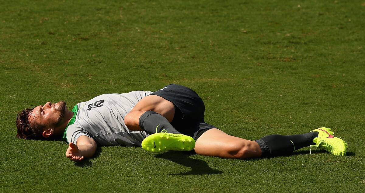 Socceroo James Holland stretches during a training session at Arena Unimed Sicoob in coastal Vitoria, Brazil. Picture: GETTY IMAGES