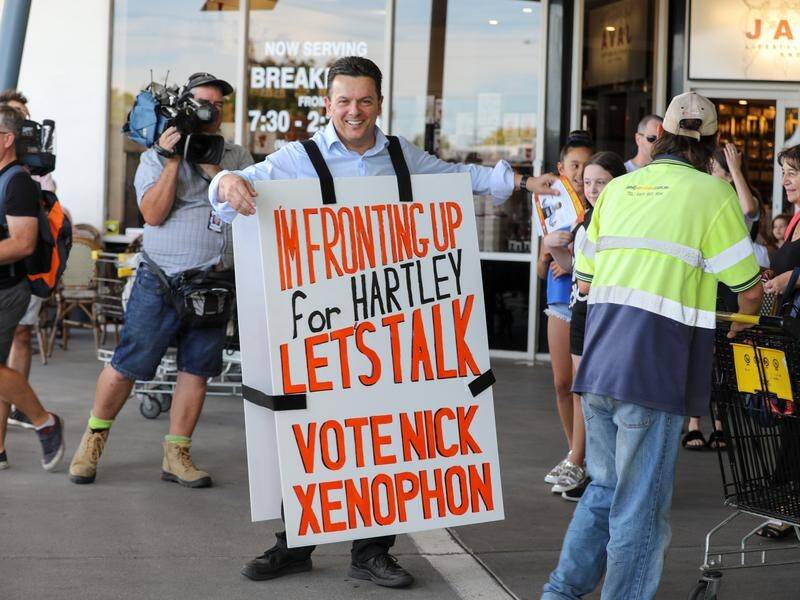 SA Best leader Nick Xenophon wears a sandwich board to launch his election campaign in Adelaide.