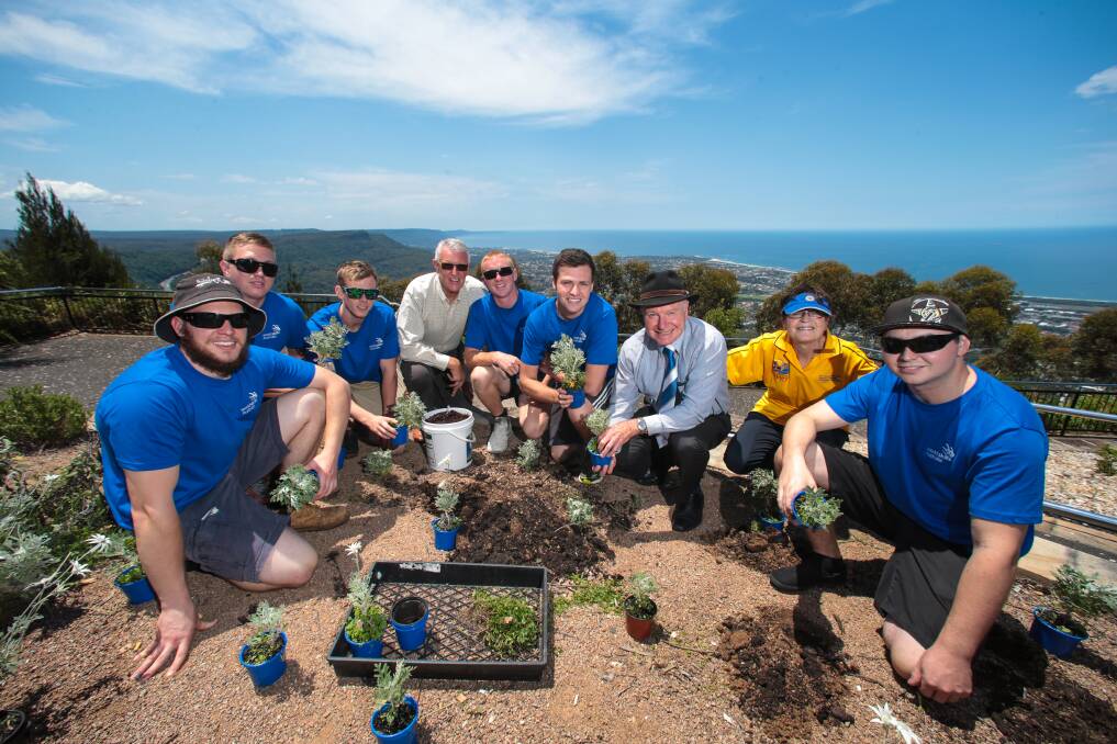 WorldSkills squad members Nick Roman, Kallom McVicar, Scott Brown, Rod Oxley (Wollongong Rotary), Sam Spong, John Reminis, Wollongong Lord Mayor Gordon Bradbery, Dot Hennessy (Rotary District 9675) and Matt Sowers at Mt Keira Lookout. Picture: ADAM McLEAN