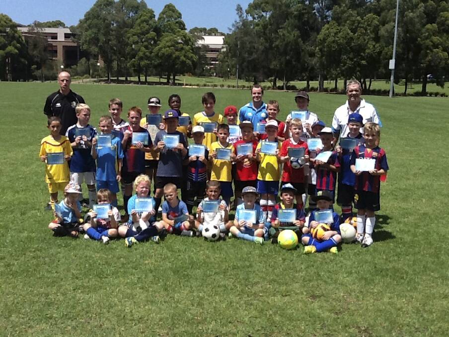 Holiday fun: Kids enjoy a recent Football South Coast school holiday clinic. The popular clinics are back on during the June-July school holidays.