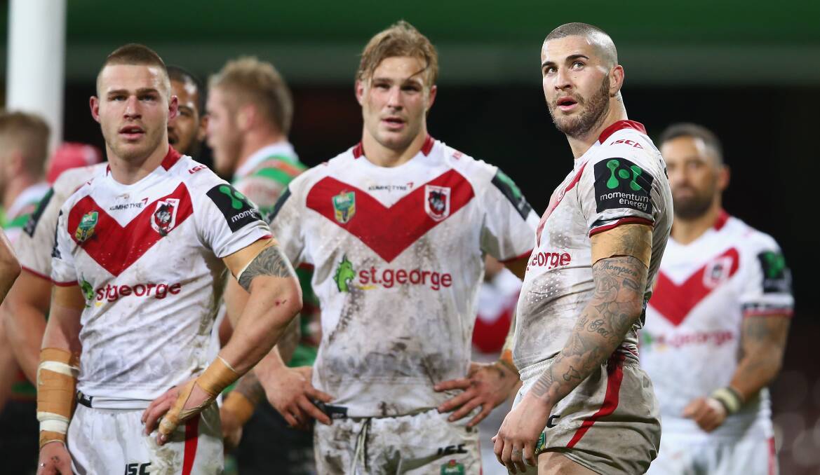 Dejected Dragons players Euan Aitken, Jack de Belin and Joel Thompson after a Rabbitohs try during their round-19 clash. Picture: GETTY IMAGES