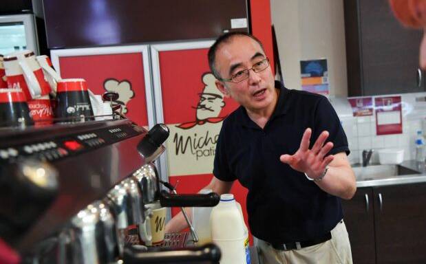 Wayne Hong, a Michel's Pattiserie franchisee, complains that RFG treats store owners poorly. Photo: Joe Armao