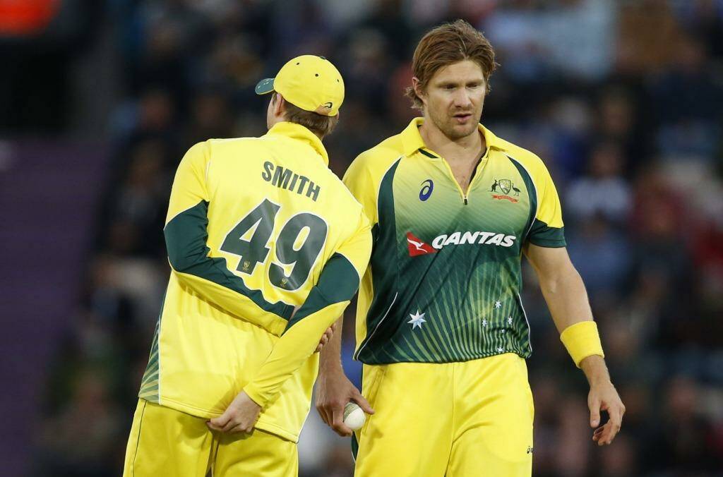 Steve Smith has words of advice for Shane Watson during the one day match against England in Southampton last week. Photo: Alastair Grant