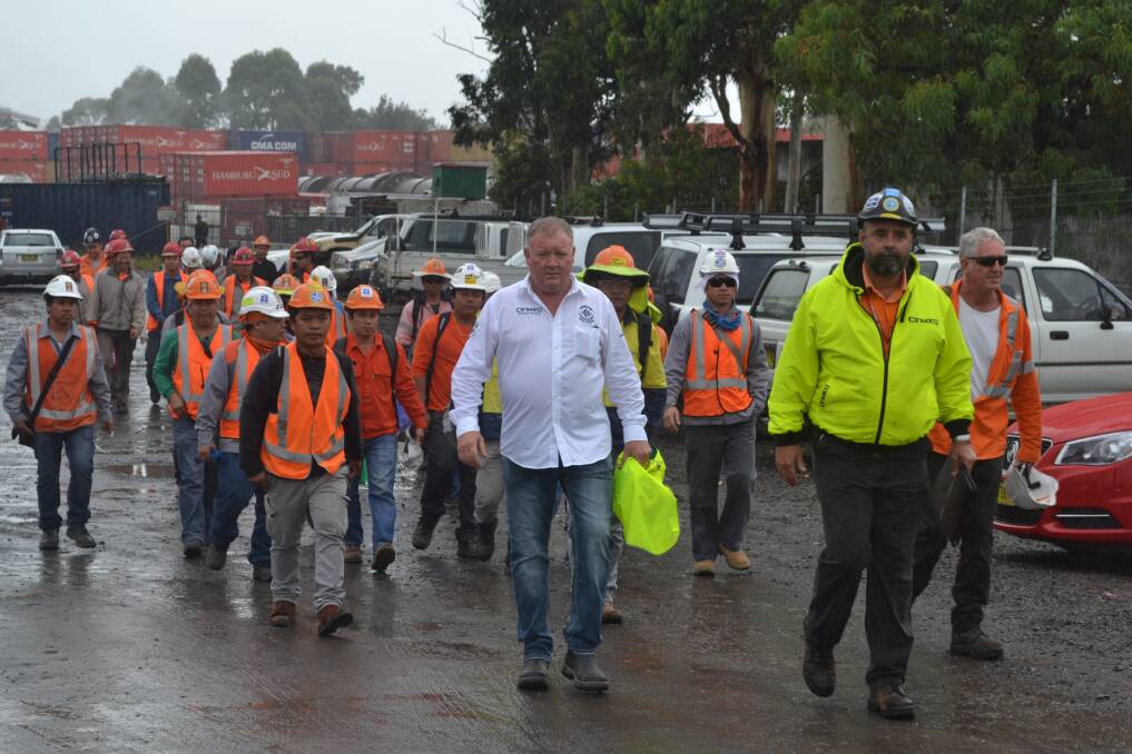 Overseas workers leave Manildra's Bomaderry site with CFMEU state secretary Brian Parker, Dave Curtain and Dave Kelly.