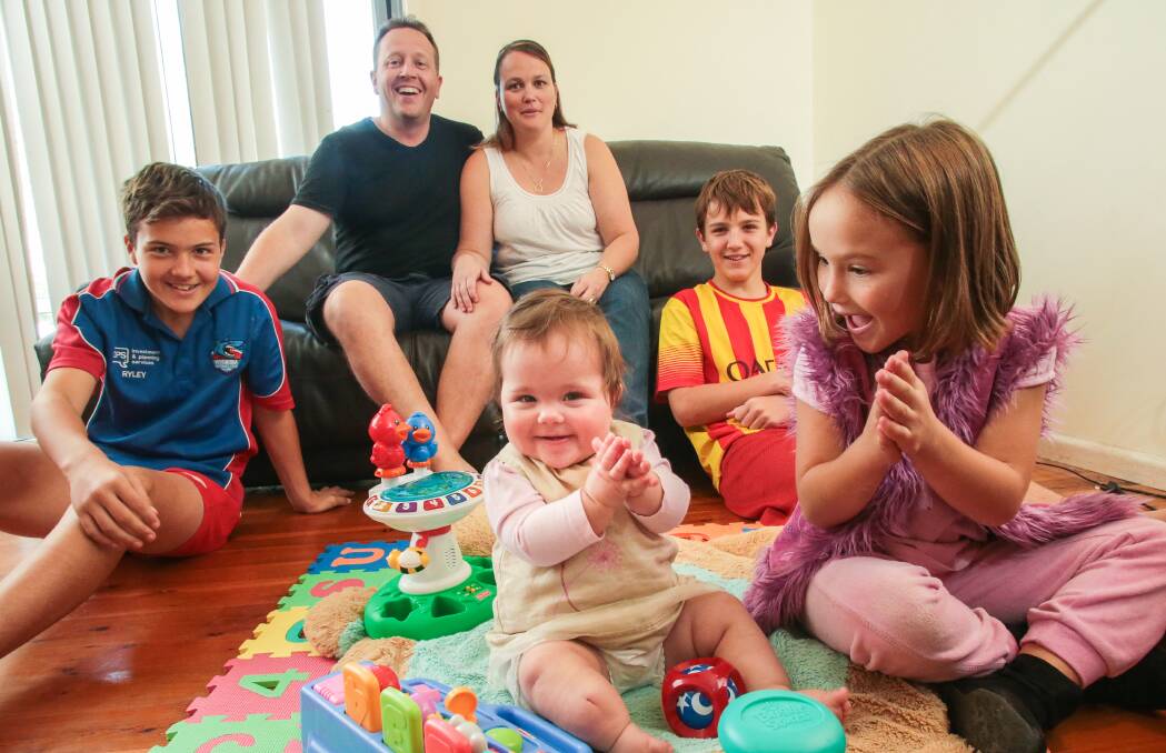 Support: Woonona 10-month-old Sophia Jans, centre, with, from left, Ryley, 13, Christian, Carley, Zachary, 14, and Holly, 7. Picture: ADAM McLEAN