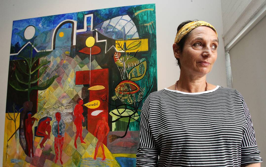 Urban landscape: Lara Seresin in front of her large art panels which form part of the International Women's Day display.Picture: GREG TOTMAN