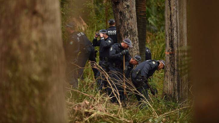 Police search for the remains of Matthew Leveson in bushland in the Royal National Park at Waterfall on Thursday. Photo: Kate Geraghty