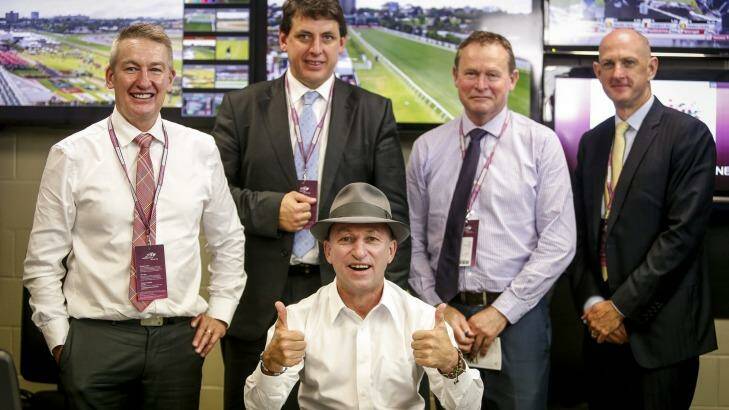 If the hat fits: Cassidy in the stewards’ room on his last day as a jockey with stipes Rob Montgomery, Terry Bailey, Robert Cram and Kim Kelly. Photo: Eddie Jim