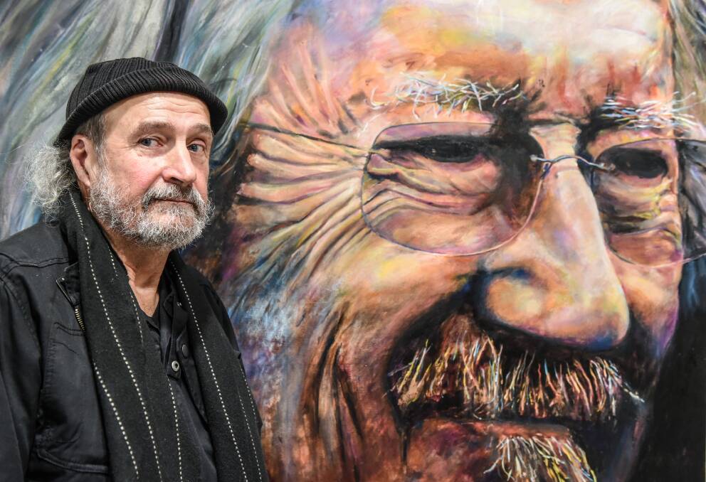 Powerful: Bruno Jean Grasswill pictured in front of his portrait of actor Michael Caton which won the Packing Room Prize. Main picture: BRENDAN ESPOSITO