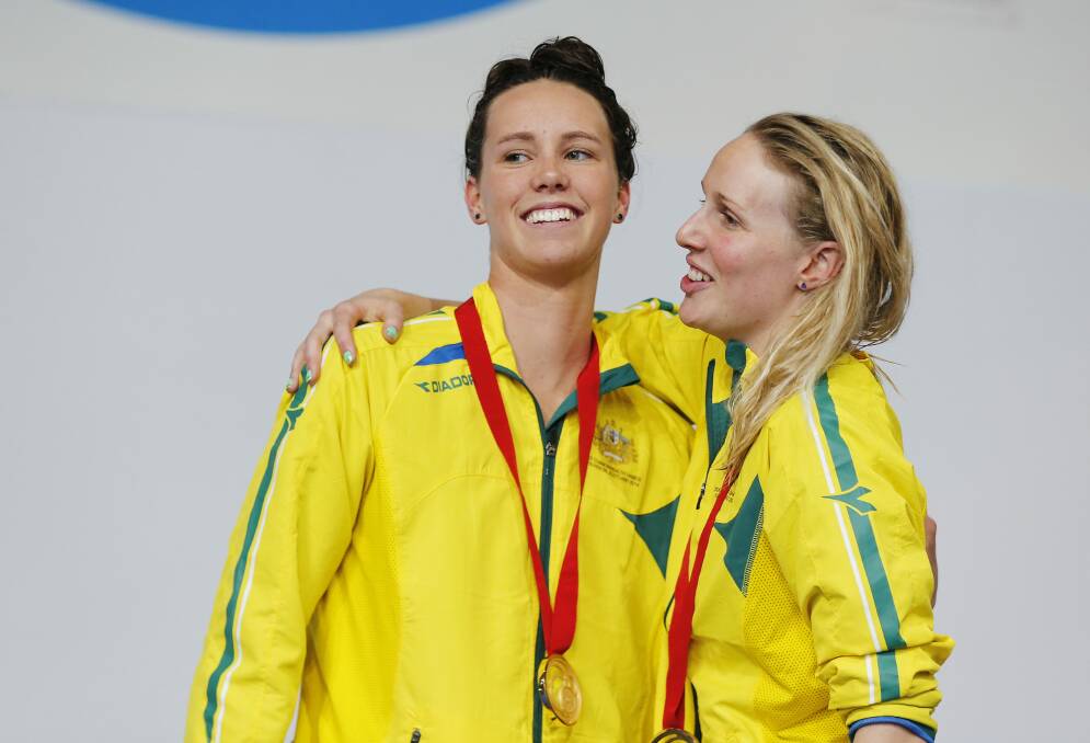 Gold medallist Emma McKeon and bronze medallist Bronte Barratt after the 200m freestyle final.  Picture: REUTERS
