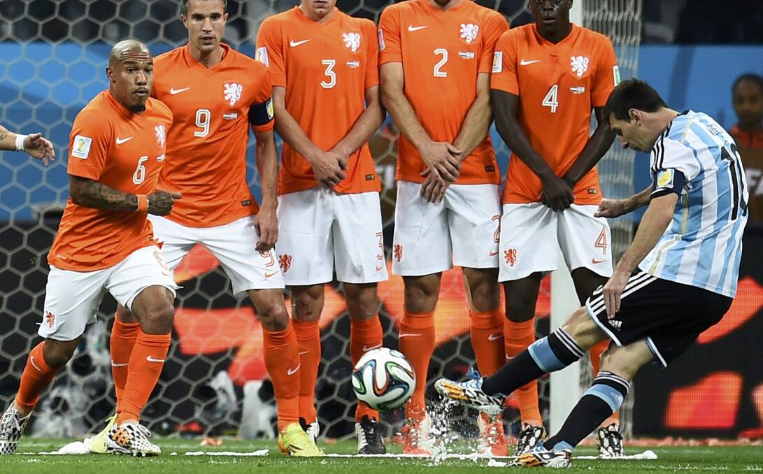 Lionel Messi takes an indirect free kick against the Netherlands. Picture: REUTERS