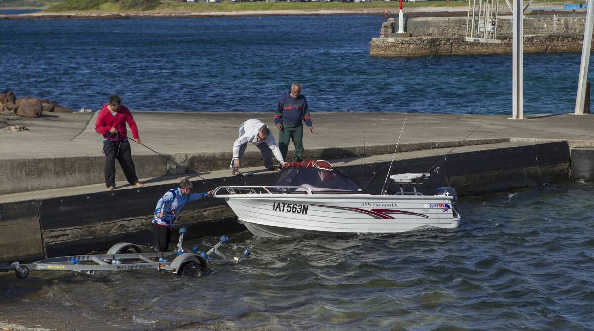 Wild trip: The trio's boat at Shellharbour. Picture: CHRISTOPHER CHAN