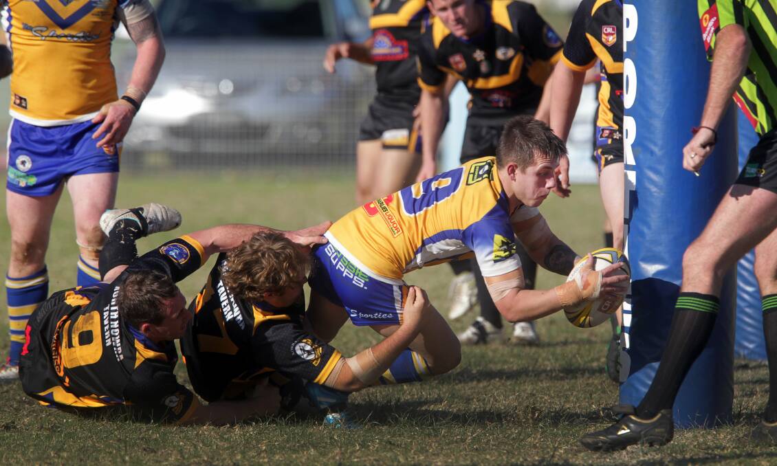 Dane Corran crosses for a try as Warilla take out the minor premiership.  Picture: SYLVIA LIBER
