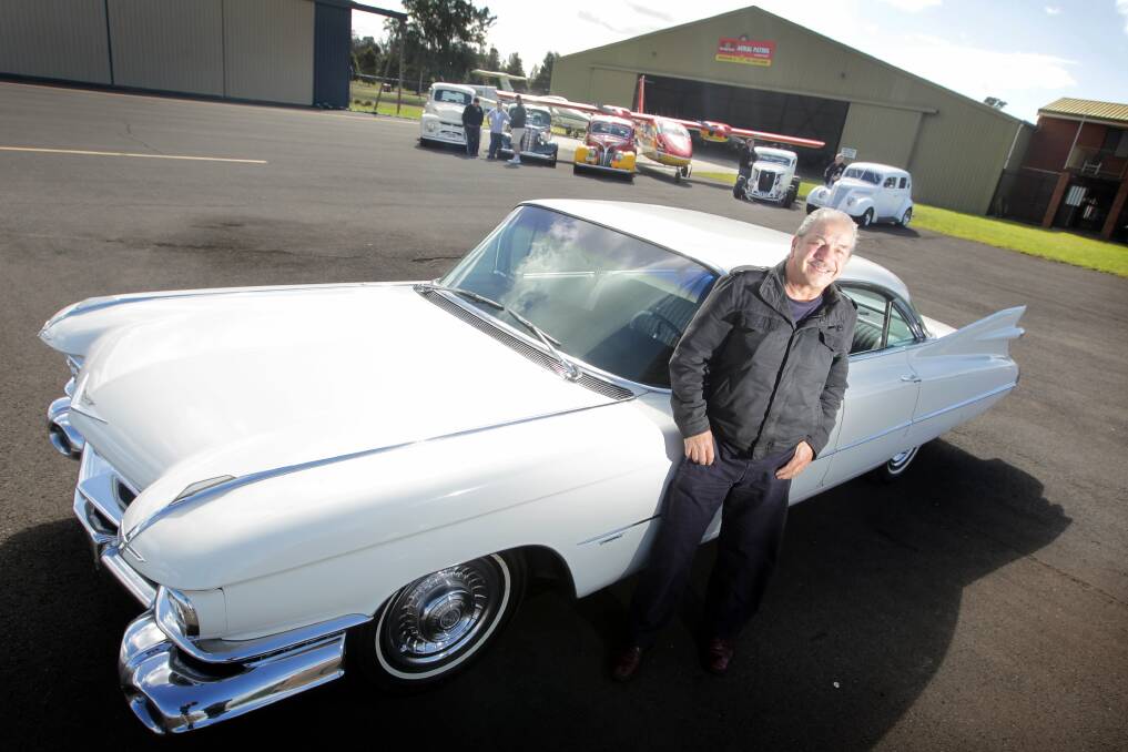 Aerial Patrol's Harry Mitchell with an entry in the Kiama hot rod show. Picture: SYLVIA LIBER