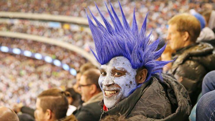 A Manchester City fan adds a bit of colour to the proceedings. Photo: Scott Barbour