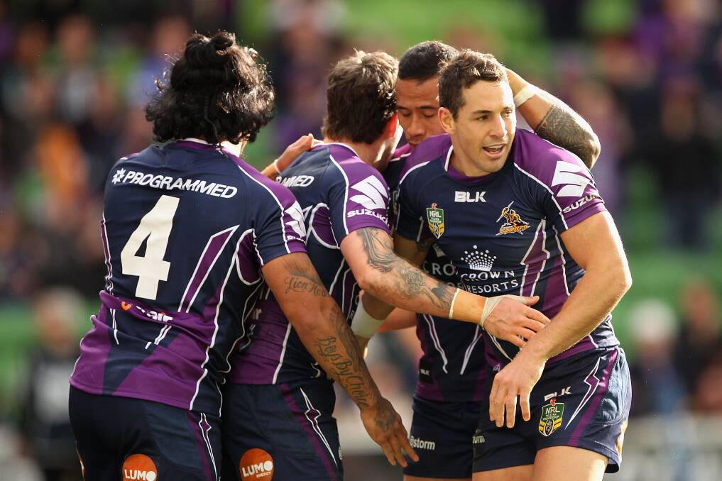 Billy Slater, right, will be one of the Melbourne Storm's danger men when they play the Dragons on Monday night. Picture: GETTY IMAGES