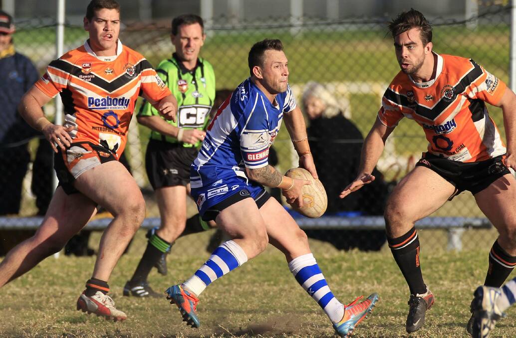 Thirroul captain coach Nathan Fien ready to offload and pass. Picture: ANDY ZAKELI