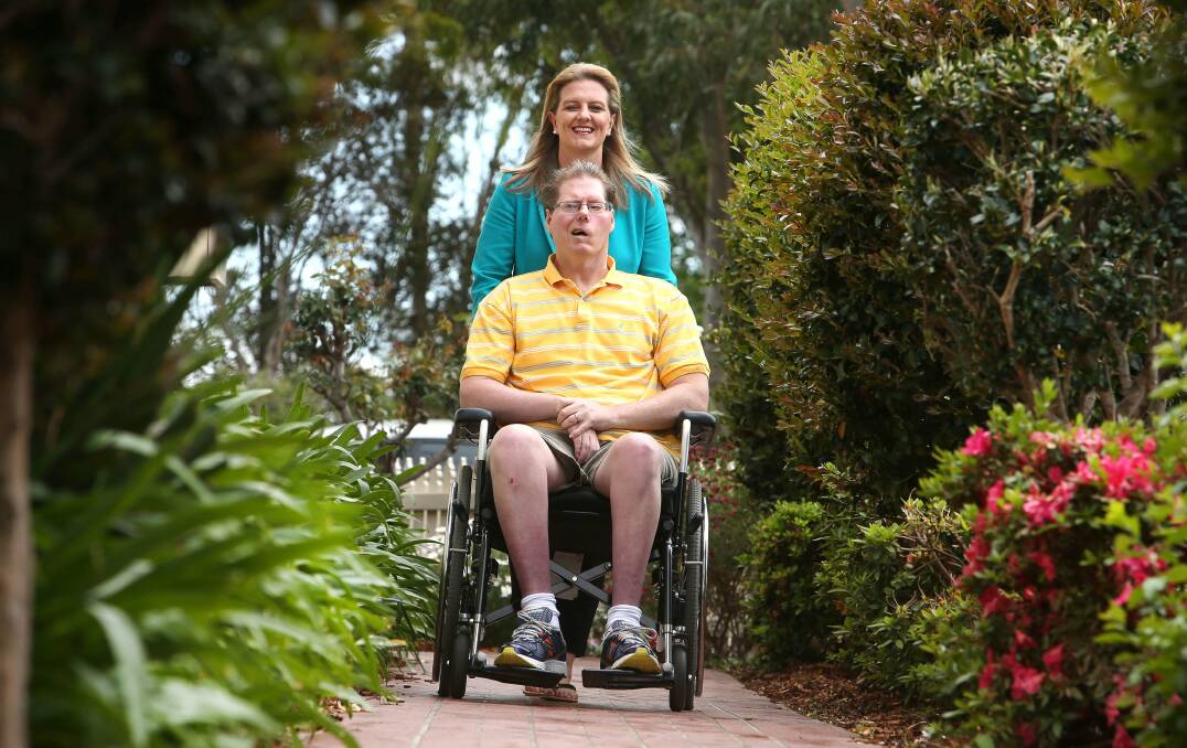 Tania Hayes and husband Warren who she has cared for for 18 years. Picture: KIRK GILMOUR