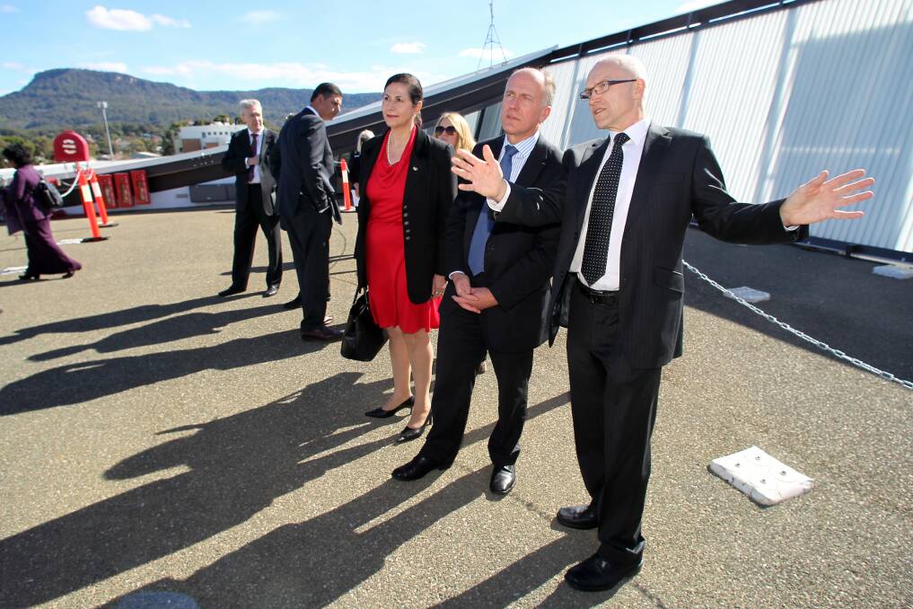 Concetta Fierravanti-Wells, Eric Abetz and Paul Cooper inspect the Sustainable Buildings Research Centre at its official opening. Picture: GREG TOTMAN