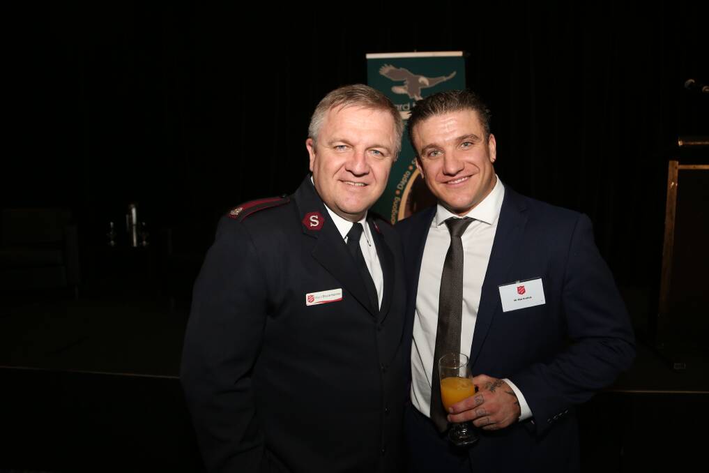 Dig deep: Major Bruce Harmer and Mat Kratiuk at the Salvation Army Red Shield Appeal launch. Mr Kratiuk credits the Salvos with saving his life. Picture: GREG ELLIS