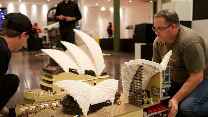 Ryan McNaught (right) and workers set up for the Lego exhibition at the Town Hall, Sydney. 25th June 2015
Photo: Wolter Peeters
The Sydney Morning Herald