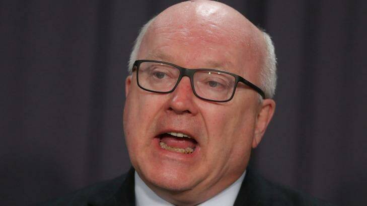 Attorney-General George Brandis consulted former Solicitor-General David Bennett after rejecting advice from Justin Gleeson. Photo: Alex Ellinghausen