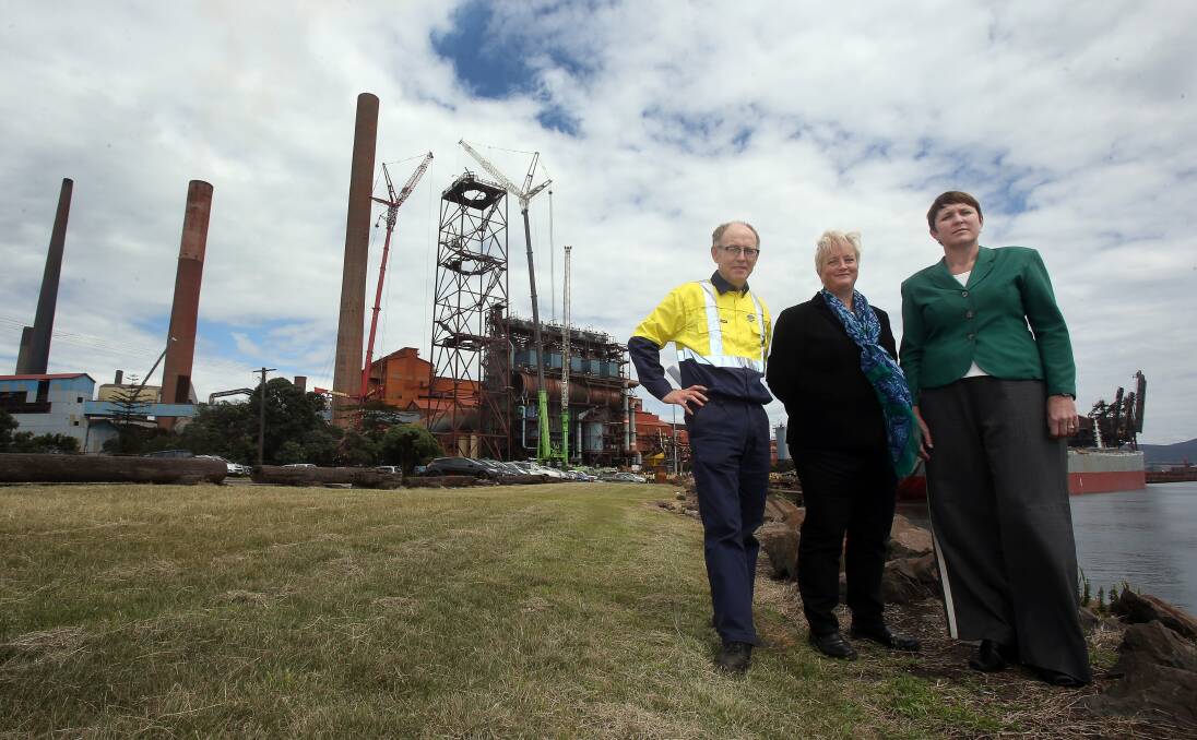 Source found: BlueScope's John Nowlan with Alison Jones, of UOW and the EPA's Giselle Howard after the fire. Picture: ROBERT PEET