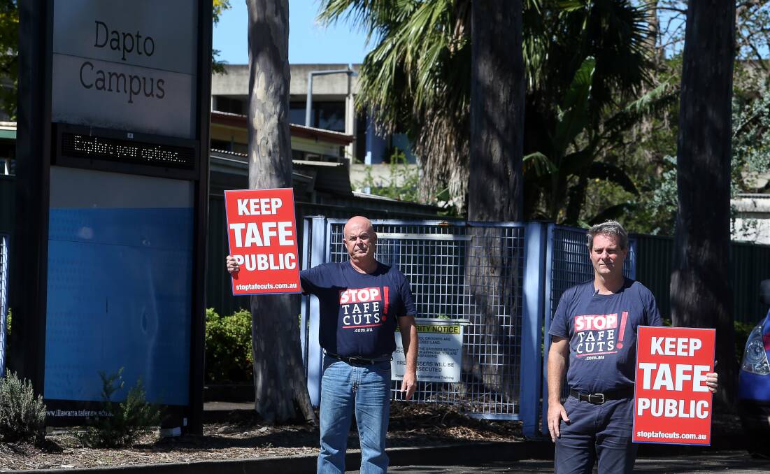 Protest: NSW TAFE teachers association president Phil Chadwick and organiser Rob Long at Dapto TAFE. Picture: Robert Peet