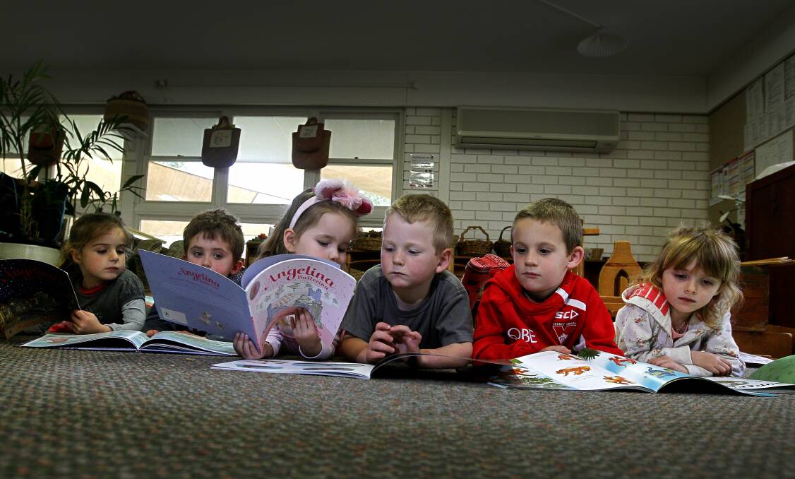 KU Bulli Preschool students Mae, Louis, Alice, Freddie, Jed and Kaja share some of their favourite stories at Book Week celebrations on Tuesday. Picture: SYLVIA LIBER