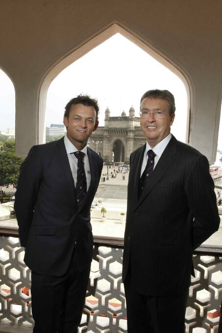 Change of role: Adam Gilchrist and UOW vice-chancellor Paul Wellings during a visit to India.