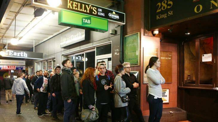 People line up to get into a pub in Newtown on June 13. Photo: Daniel Munoz