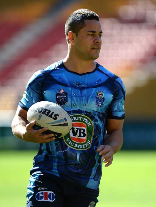 BRISBANE, AUSTRALIA - JULY 08: Jarryd Hayne runs with the ball during a New South Wales State of Origin captain's run at Suncorp Stadium on July 8, 2014 in Brisbane, Australia.  (Photo by Bradley Kanaris/Getty Images)