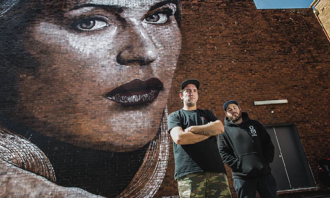 Street art: Artist Mitch Guerin with Wonderwalls organiser Simon Grant. Big things are planned for the third festival.