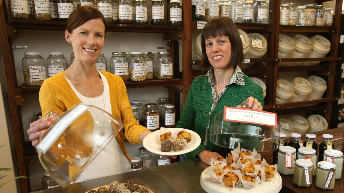 Stephanie Meades and Mariel Hiney-Wilms will help find creative ways to work superfoods into your diet at the Flame Tree Community Food Co-op stand at the Wild Rumpus Makers Markets. Picture: KIRK GILMOUR