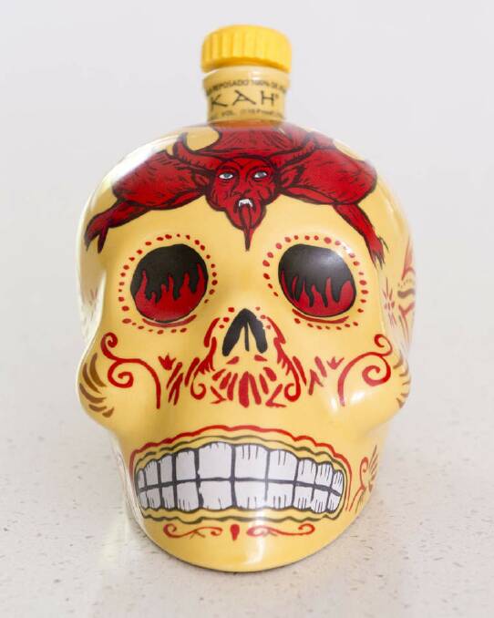 Favourite tipple: Kah reposado (oak aged) tequila in a Day of the Dead bottle. Photo: Harrison Saragossi