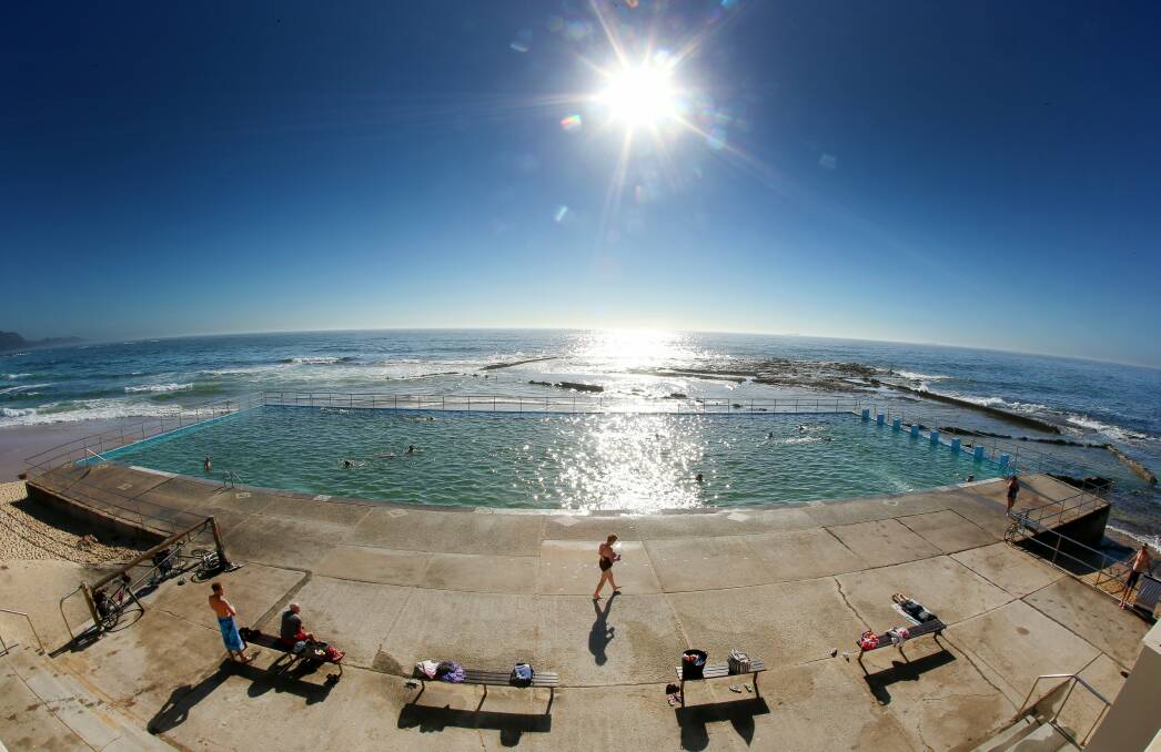 Swimmers enjoy Woonona rock pool during summer. Picture: KIRK GILMOUR