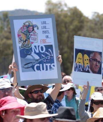 Protesters rally against ABC budget cuts outside Parliament House on Tuesday. Photo: Andrew Meares