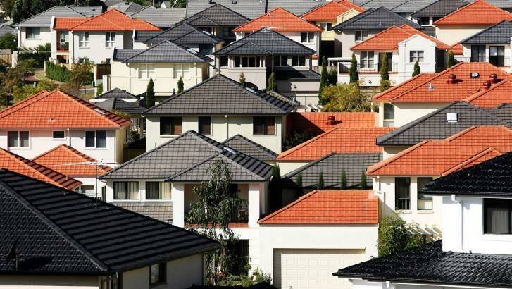 Low interest rates and high supply have caused a boom in the Sydney and Melbourne housing markets. Photo: Louie Douvis