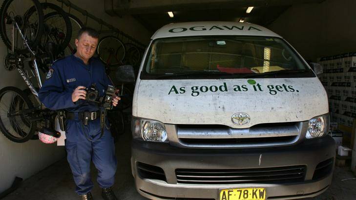 Police finger print and photograph Kok On Chin's van after he was killed in October 2006. Photo: Kate Geraghty