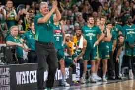 JackJumpers coach Scott Roth applauds his side's efforts in the game-two win over Melbourne United. (Linda Higginson/AAP PHOTOS)