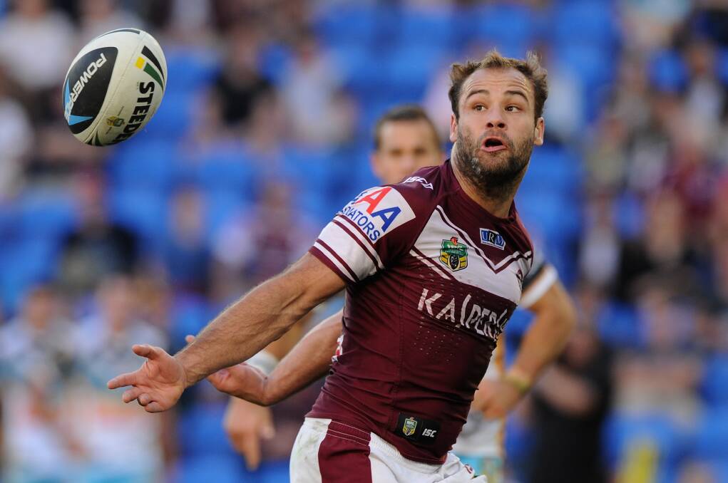 Sea Eagles fullback Brett Stewart juggles the ball in their match against a dogged Gold Coast Titans. Picture: GETTY IMAGES