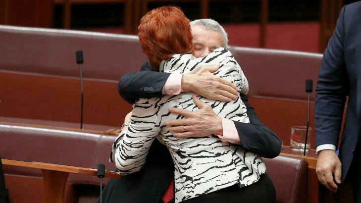 Senator Roberts is congratulated by Senator Pauline Hanson after delivering his first speech. Photo: Alex Ellinghausen