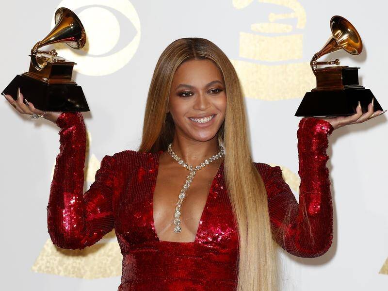 Beyonce's success may have been helped by her light skin, her father says.