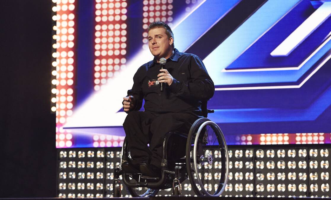 Mick Sattin on stage on the X Factor