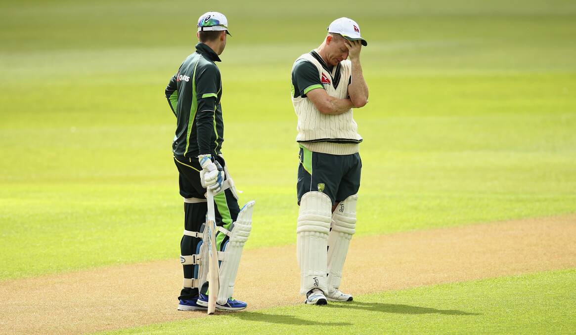 Michael Clarke and Chris Rogers talk tactics during a net session at Trent Bridge before the fourth Test. Picture: GETTY IMAGES