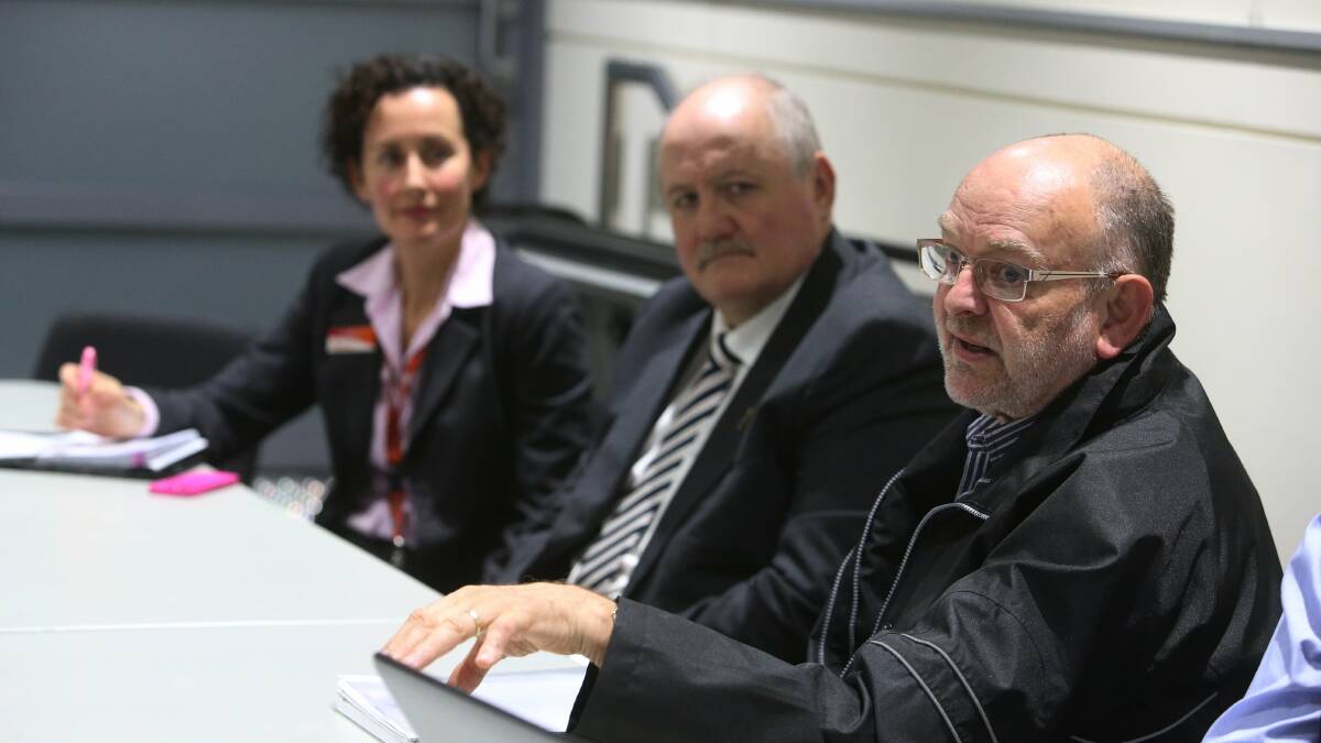 Candice-Anne Heine,  Lee Evans and neighbourhood convener Stephen Kennard at Tuesday night’s meeting about  train timetables. Pictures: ROBERT PEET