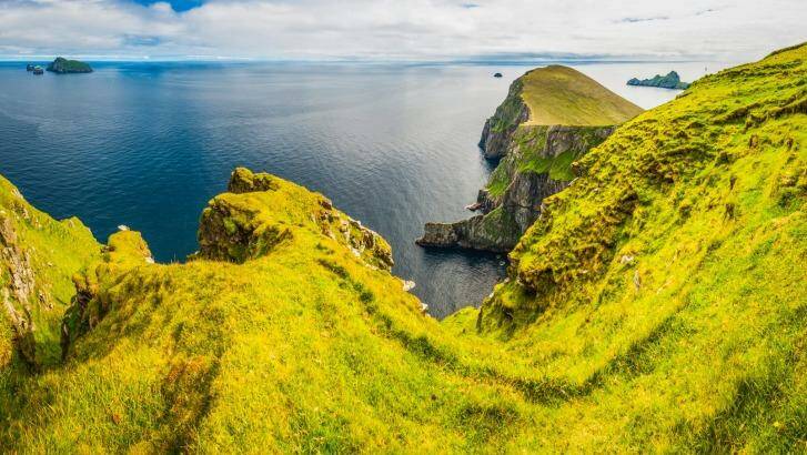 The green pastures and cliffs of St Kilda. Photo: fotoVoyager