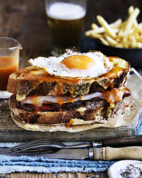 Francesinha (Portugal's answer to the croque-madame) is a huge meat-filled monster topped with egg and cheese and smothered in a beer-based sauce. French fries optional <a href="http://www.goodfood.com.au/good-food/cook/recipe/francesinha-portuguese-croquemadame-20140813-3dmg9.html"><b>(Recipe here).</b></a> Photo: William Meppem